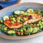 Edamame and cucumber salad with fried salmon