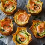 Mini quiches with salmon and courgettes