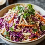 Crunchy Asian Cabbage Slaw with Addictive Sesame Dressing Upgrade 8 Crunchy Asian Cabbage Slaw with Addictive Sesame Dressing: A Bright, Bold, Irresistible Classic