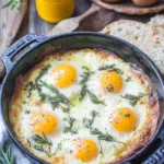 Cozy Baked Eggs with Rosemary and Thyme for a Savory Start 8 Baked Eggs with Rosemary and Thyme